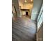 View of kitchen area, featuring wood flooring, cabinets, and natural light streaming in from outdoors at 921 Nottingham Dr # 6, Gastonia, NC 28054