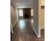 Spacious living room features a brick fireplace, wood flooring, and plenty of natural light at 921 Nottingham Dr # 6, Gastonia, NC 28054
