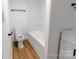 Clean, bright bathroom features a combined tub and shower at 940 N New Hope Rd, Gastonia, NC 28054