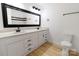 Elegant bathroom features a double sink vanity with a large mirror at 940 N New Hope Rd, Gastonia, NC 28054