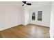 Bright, neutral bedroom features laminate flooring and ample natural light from the window at 940 N New Hope Rd, Gastonia, NC 28054