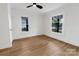 Well-lit bedroom features laminate flooring and ample natural light from the windows at 940 N New Hope Rd, Gastonia, NC 28054