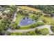 An aerial view of the community pond and surrounding walking path at 9814 Tompkins Ln, Waxhaw, NC 28173