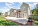 Charming home with a large concrete patio perfect for outdoor entertaining and relaxation at 9814 Tompkins Ln, Waxhaw, NC 28173
