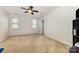 Spacious bedroom with neutral walls, carpet, and a ceiling fan at 9814 Tompkins Ln, Waxhaw, NC 28173