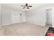 Spacious carpeted bedroom has a ceiling fan and lots of closet space at 9814 Tompkins Ln, Waxhaw, NC 28173