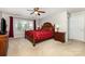 Main bedroom features a ceiling fan, window, and en-suite bathroom at 9814 Tompkins Ln, Waxhaw, NC 28173