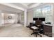 Bright office space featuring large windows providing natural light and neutral colored carpet at 9814 Tompkins Ln, Waxhaw, NC 28173