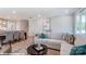 Inviting living room with a view of the dining area, cozy seating, and stylish decor at 9842 Quercus Ln, Huntersville, NC 28078