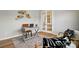 Stylish home office featuring a modern desk, seating, and elegant decor at 9842 Quercus Ln, Huntersville, NC 28078