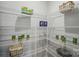 Walk-in pantry with white wire shelving for ample storage of food and household items at 9842 Quercus Ln, Huntersville, NC 28078