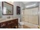 A classic bathroom with a shower-tub combo, and a wood vanity with sink at 10304 Squires Way # 18, Cornelius, NC 28031
