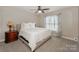 Bright bedroom featuring carpet, ceiling fan, and lots of natural light at 10304 Squires Way # 18, Cornelius, NC 28031