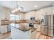 Bright kitchen with stainless steel appliances, granite countertops, and ample storage space at 10304 Squires Way # 18, Cornelius, NC 28031