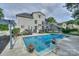 Backyard pool, perfect for summer fun, surrounded by lush landscaping at 10304 Squires Way # 18, Cornelius, NC 28031