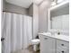 This functional bathroom features a neutral color palette and a shower with tub at 10875 Casetta Dr, Matthews, NC 28105