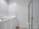 Featuring a walk-in shower, this bathroom boasts safety and accessibility features at 10875 Casetta Dr, Matthews, NC 28105