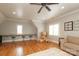 Bonus room features hardwood floors, built-in desk and seating with a oversized stuffed animal at 1103 Mapesbury Ln, Waxhaw, NC 28173