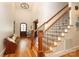 Entryway with a staircase, wood floors, and natural light at 1103 Mapesbury Ln, Waxhaw, NC 28173