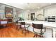 Bright kitchen with a center island, barstool seating and stainless steel appliances at 1103 Mapesbury Ln, Waxhaw, NC 28173