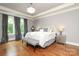 Spacious main bedroom with hardwood floors, large windows, and ample natural light at 1103 Mapesbury Ln, Waxhaw, NC 28173