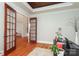 Bright office space with hardwood floors, fireplace, and french doors at 1103 Mapesbury Ln, Waxhaw, NC 28173