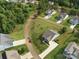 Picturesque aerial view of a neighborhood with manicured lawns and mature trees at 11225 Island View Ln, Lancaster, SC 29720