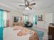 Spacious bedroom featuring an accent rug, a decorative bed, and a view to a bathroom at 11225 Island View Ln, Lancaster, SC 29720