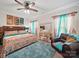Spacious bedroom featuring an accent rug, a decorative bed, and a stylish sitting area at 11225 Island View Ln, Lancaster, SC 29720