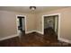 Bedroom with neutral walls and hardwood floors, featuring natural light at 1216 Mountain Ave, Gastonia, NC 28052