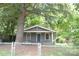 Charming single-story home featuring a blue front door and inviting curb appeal at 1216 Mountain Ave, Gastonia, NC 28052