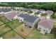 Aerial view of neighborhood with fenced backyards and well-maintained lawns at 12536 Stoneybrook Pkwy, Huntersville, NC 28078