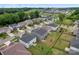 Aerial view of neighborhood with community pool and fenced backyards at 12536 Stoneybrook Pkwy, Huntersville, NC 28078