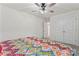 Bright bedroom with ceiling fan, carpet, and closet at 12536 Stoneybrook Pkwy, Huntersville, NC 28078