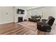 Cozy living room featuring a fireplace, flat-screen TV, and comfortable seating at 12536 Stoneybrook Pkwy, Huntersville, NC 28078
