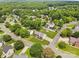 Scenic aerial view of neighborhood, highlighting well-maintained homes and tree-lined streets at 126 Rocky Trail Ct, Fort Mill, SC 29715