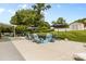 Inviting backyard patio with outdoor seating, lush landscaping, and storage shed, perfect for relaxing and entertaining at 126 Rocky Trail Ct, Fort Mill, SC 29715