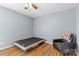 This cozy bedroom features wood floors and a comfortable sitting area at 126 Rocky Trail Ct, Fort Mill, SC 29715