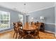 Charming dining room with chandelier lighting and natural sunlight at 126 Rocky Trail Ct, Fort Mill, SC 29715