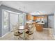 Eat-in kitchen features tile floor, modern appliances, and a breakfast table at 126 Rocky Trail Ct, Fort Mill, SC 29715