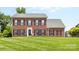 Beautiful brick home with meticulously maintained lawn and classic black shutters at 126 Rocky Trail Ct, Fort Mill, SC 29715
