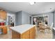 Bright kitchen featuring an island, eat-in table, and open layout to the living area at 126 Rocky Trail Ct, Fort Mill, SC 29715