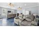 Spacious living room features multiple recliners, fans, and a refrigerator at 126 Rocky Trail Ct, Fort Mill, SC 29715