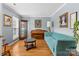 Bright living room with hardwood floors, elegant decor, and natural light at 126 Rocky Trail Ct, Fort Mill, SC 29715