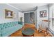 Comfortable living room with hardwood floors and stylish turquoise sofa at 126 Rocky Trail Ct, Fort Mill, SC 29715