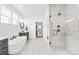 Elegant bathroom boasts a soaking tub, marble walk-in shower, and modern fixtures at 126 Still Creek Dr, Mooresville, NC 28115