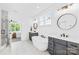 Elegant bathroom showcases a soaking tub, dual vanities, and natural lighting at 126 Still Creek Dr, Mooresville, NC 28115