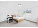 Bright bedroom featuring a bed, drums, carpeted floors, and a large window at 126 Still Creek Dr, Mooresville, NC 28115