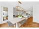 Dining area featuring modern lighting and view to the kitchen and living area at 126 Still Creek Dr, Mooresville, NC 28115