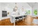 Modern kitchen with large island, white countertops, and stylish pendant lighting at 126 Still Creek Dr, Mooresville, NC 28115